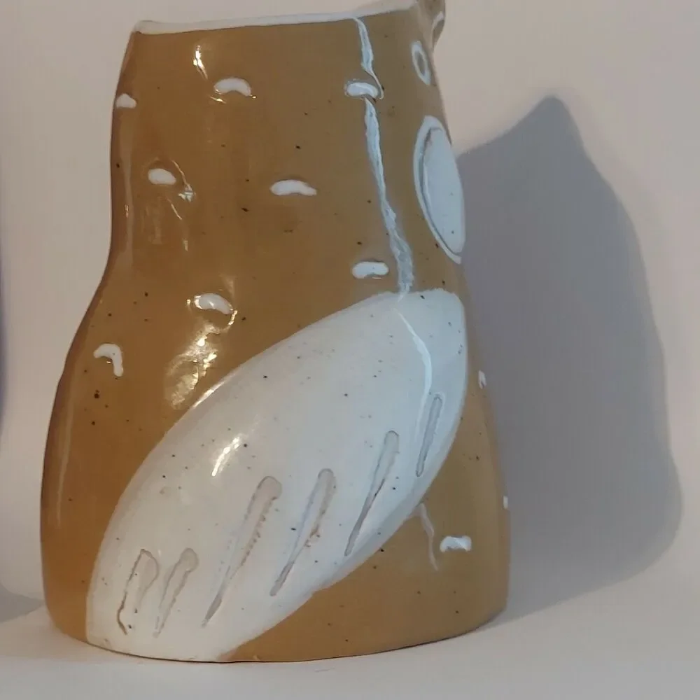 Anthropologie tan white